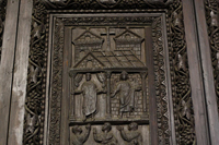 Door with Angel and figure in orant pose - acclamation by six below. 