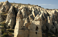 Rock houses and fairy chimneys near Goreme, Turkey, Cappadocia. 